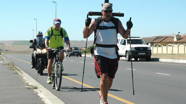 Pastor Paul Wright nears the end of his marathon walk.